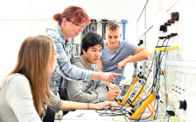 students taking measurements in an electrial class